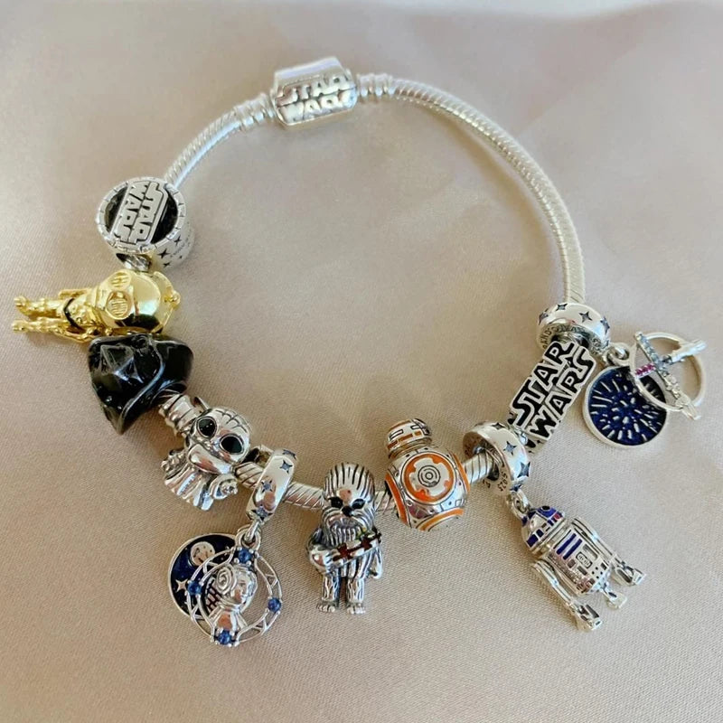 Charms y pulsera de plata con tematica de Star Wars y Marvel